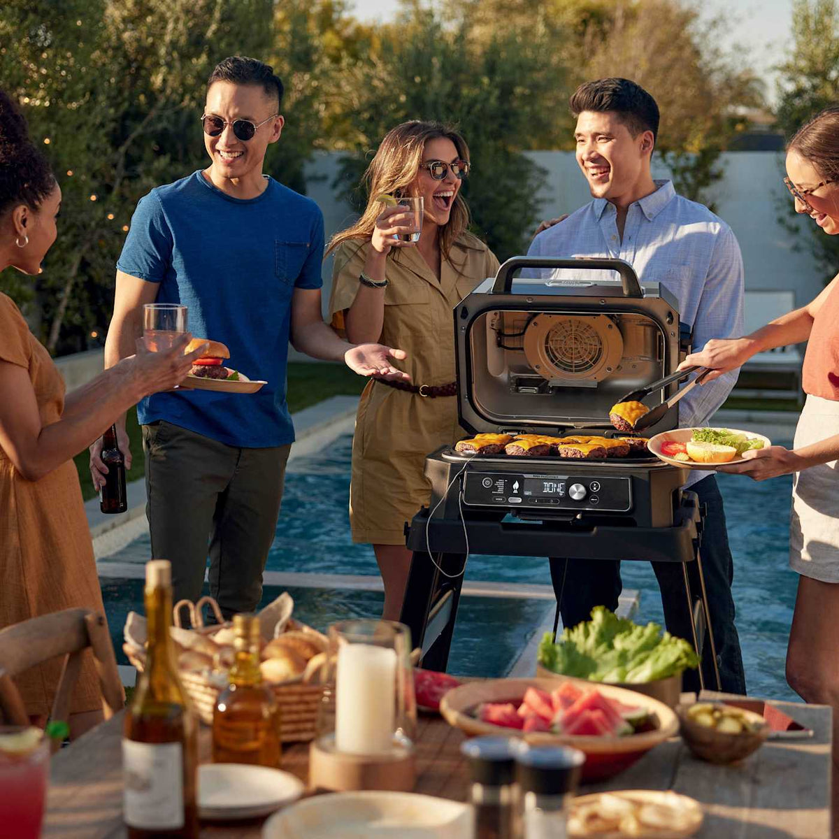 Ninja Woodfire Grill & Smoker and Ninja FrostVault™ 30qt Cooler Bundle